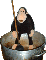 Monkey in giant pot with giant spoon