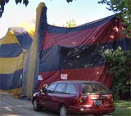 House under a tent.